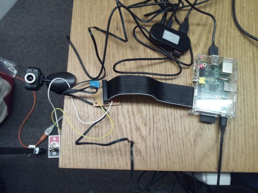 HackerSpace Monitor during development. The switch on the left side is for status messages, there is also a wireless adapter attached to the USB hub.